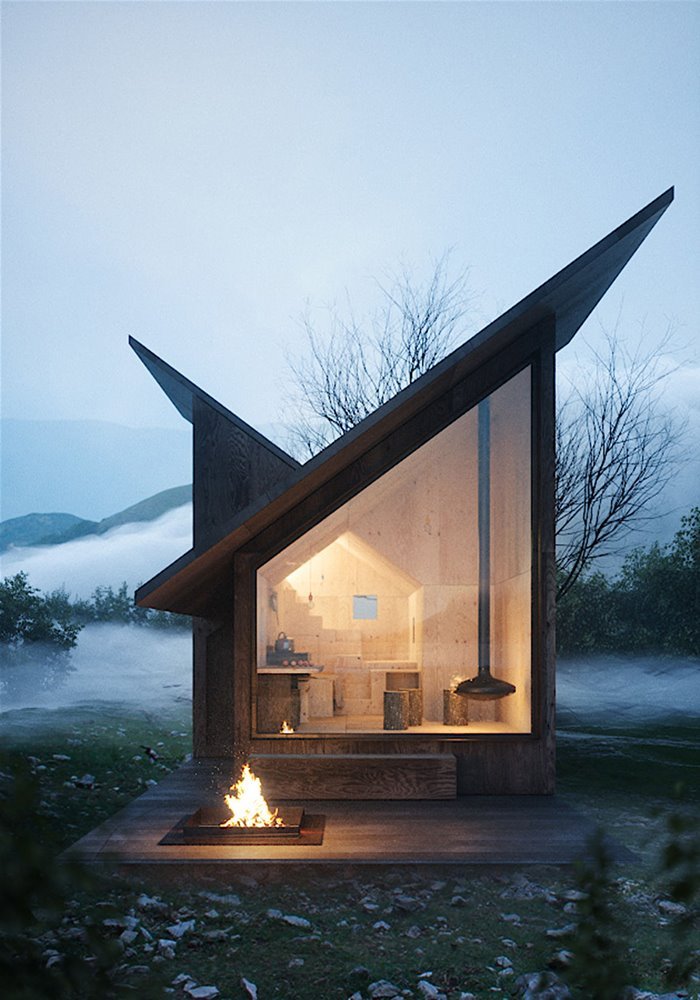 cabaña de madera con un fogón en el patio y amplio ventanal que deja ver el interior de la casa.