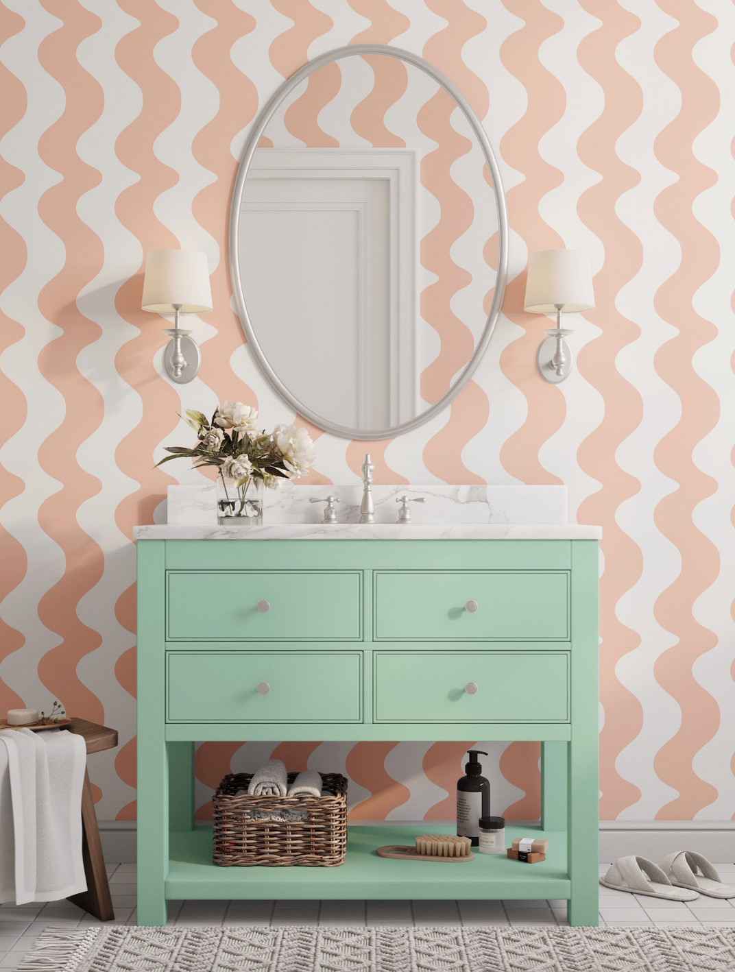 mueble de baño en verde turquesa con papel pintado en forma de ondas blancas y naranjas y espejo ovalado