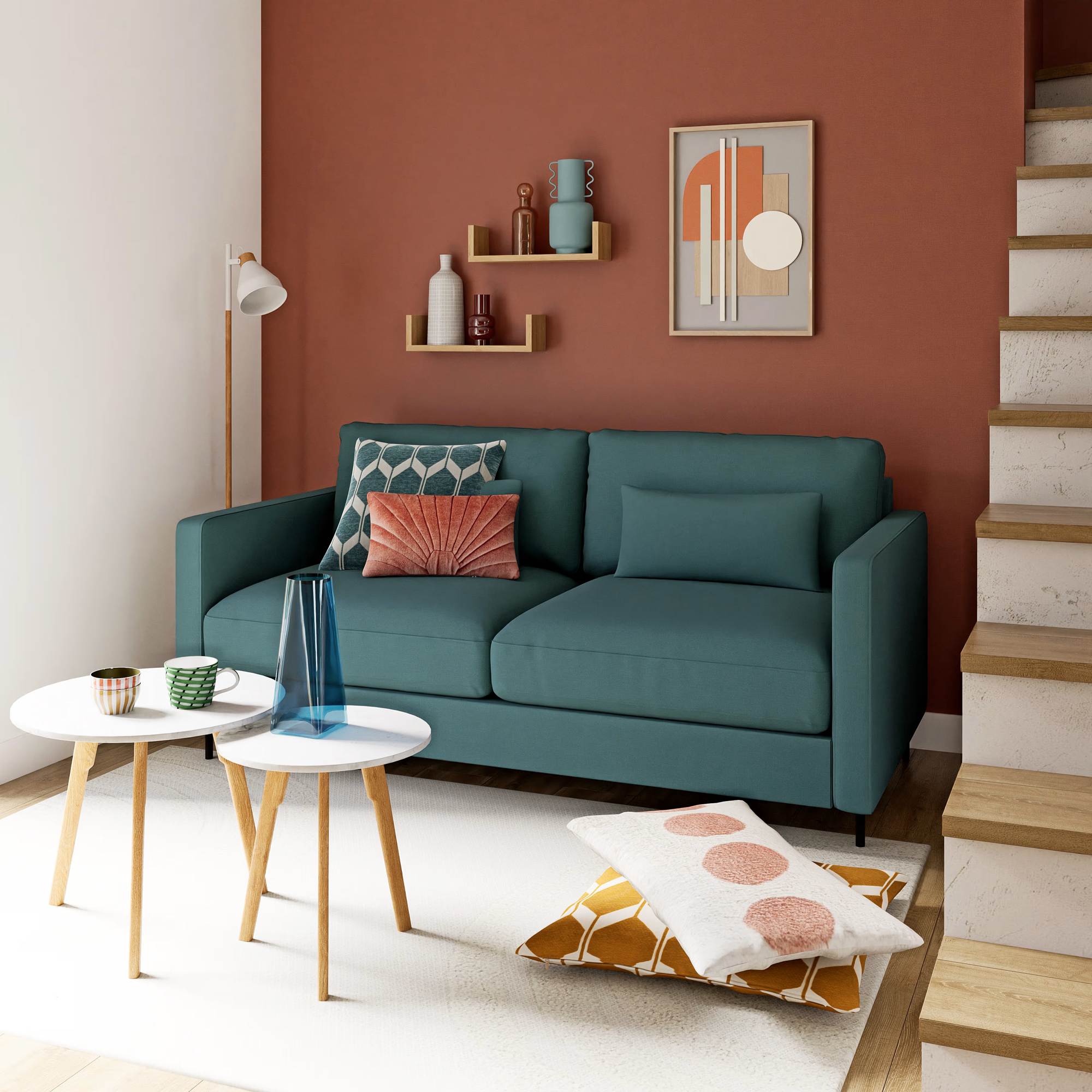 Habitación moderna de sofá celeste y pared de acento en terracota. Mesitas de café blanca con patas de madera natural.